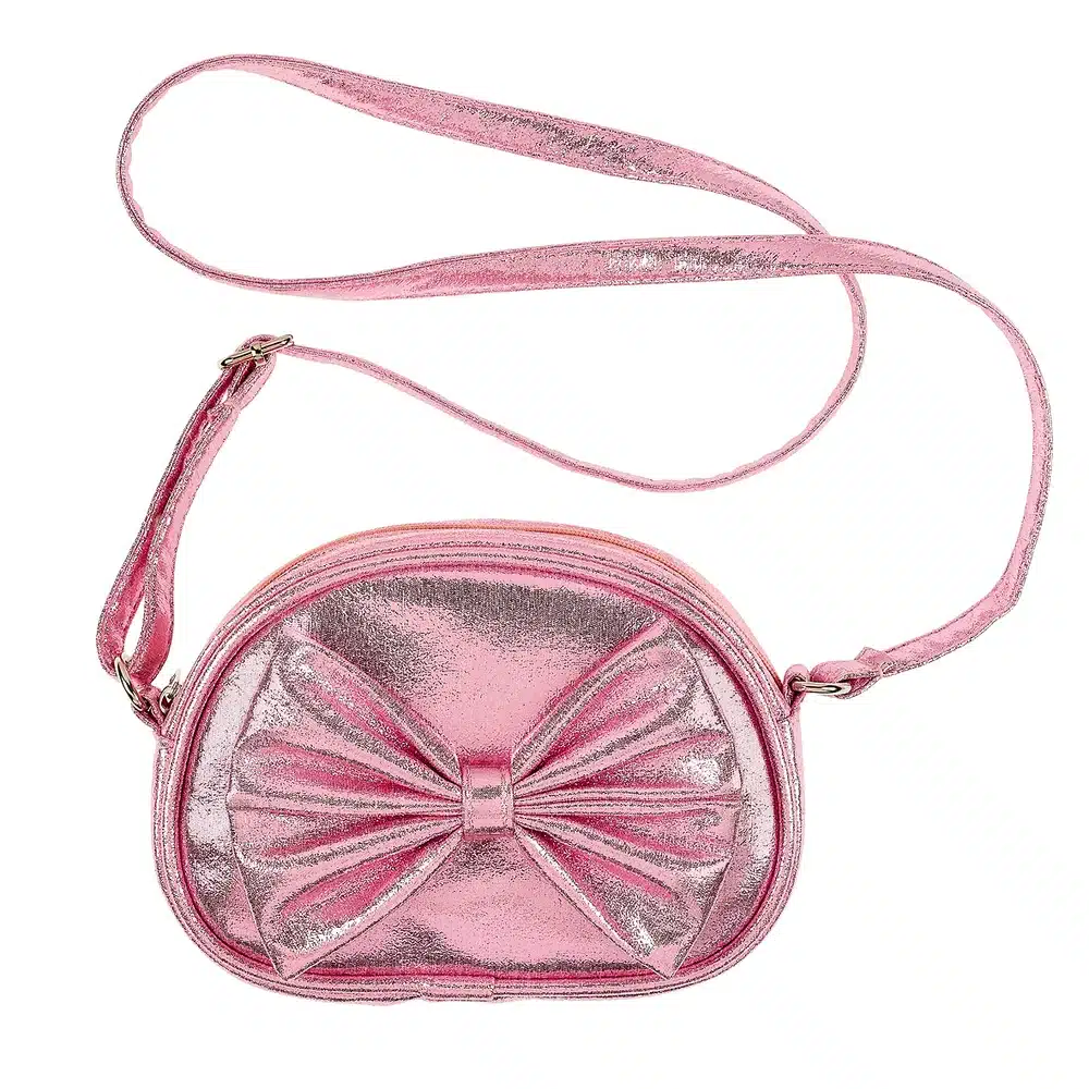 Souza schoudertas voor kinderen in glanzend roze metallic met grote strik, ritssluiting en verstelbaar schouderbandje.